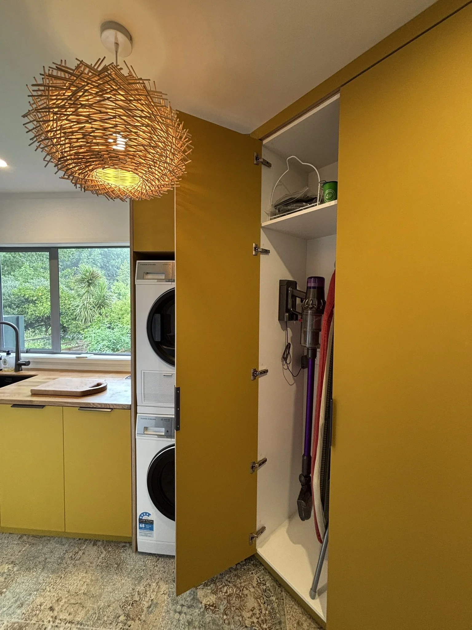 Laundry wall storage – custom cabinetry