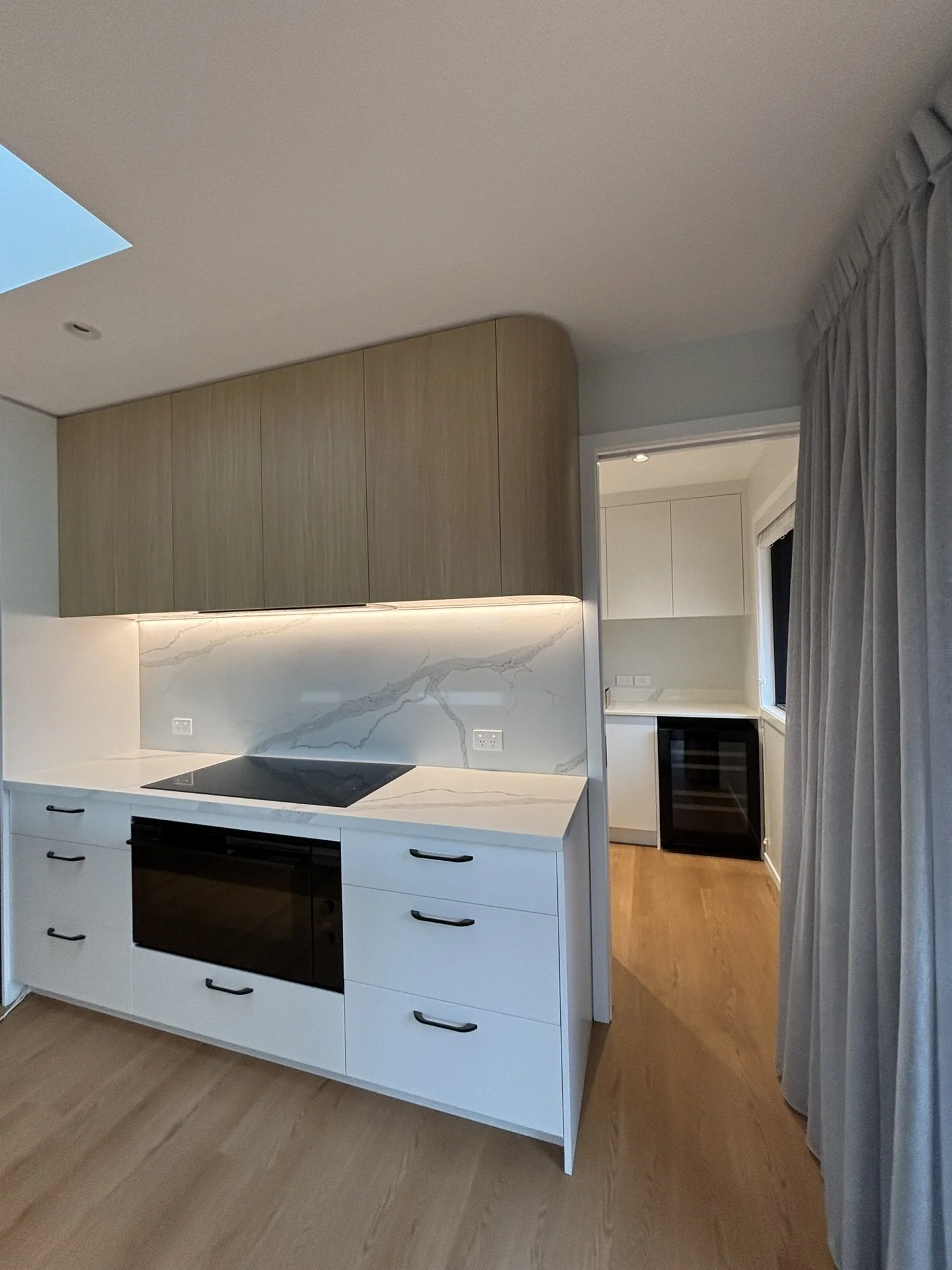 Black Handles on White Cabinetry - Northland