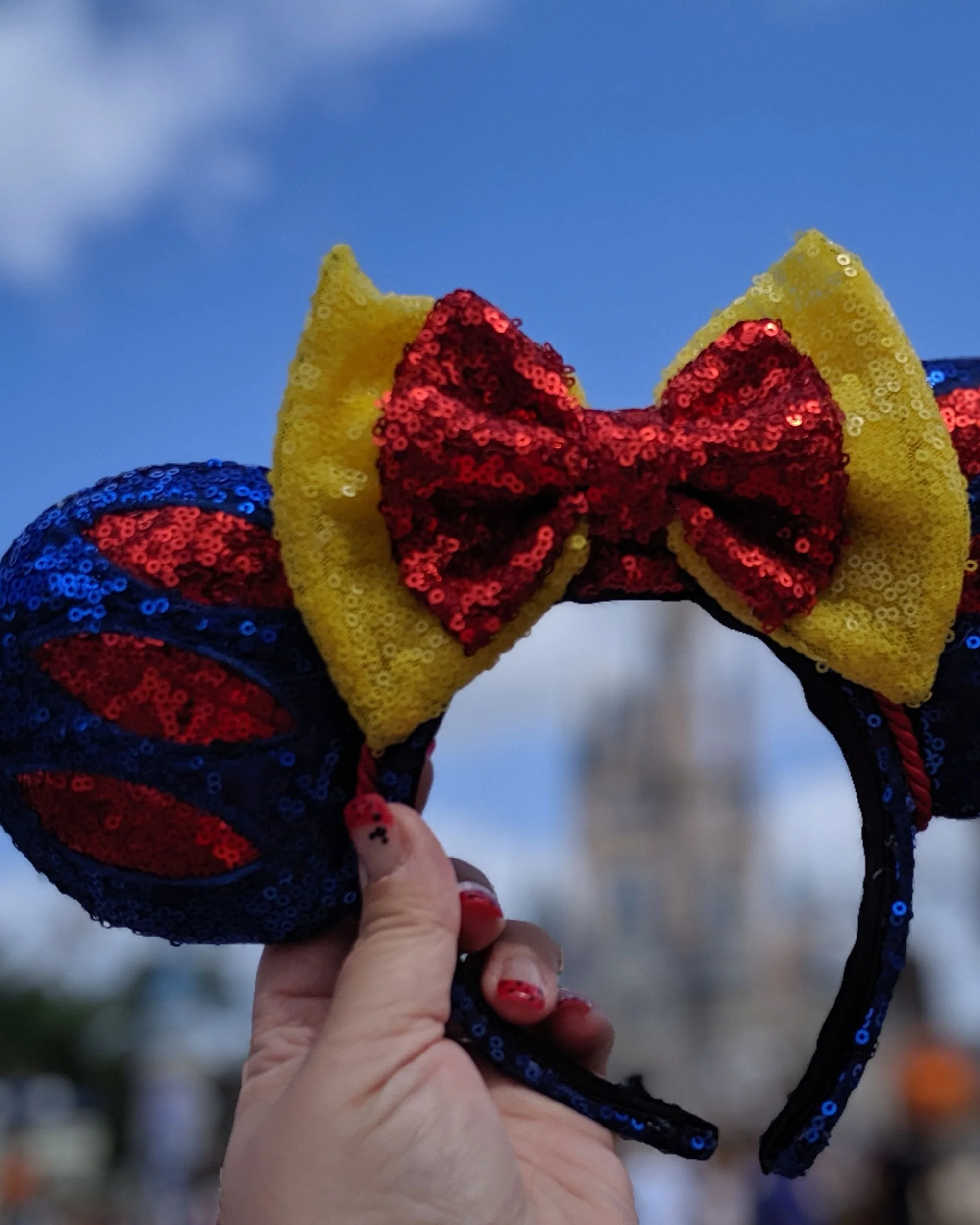 Handmade Theme Park Ears inspired by Snow White, crafted by Creatively Speaking Designs.