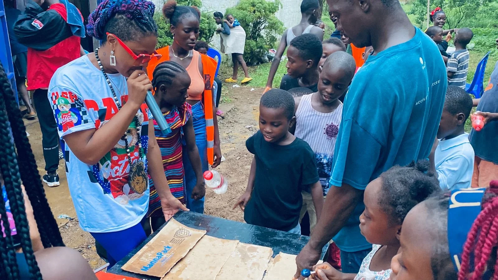 Scan lending a helping hand by volunteering and bringing her non-profit to Africa