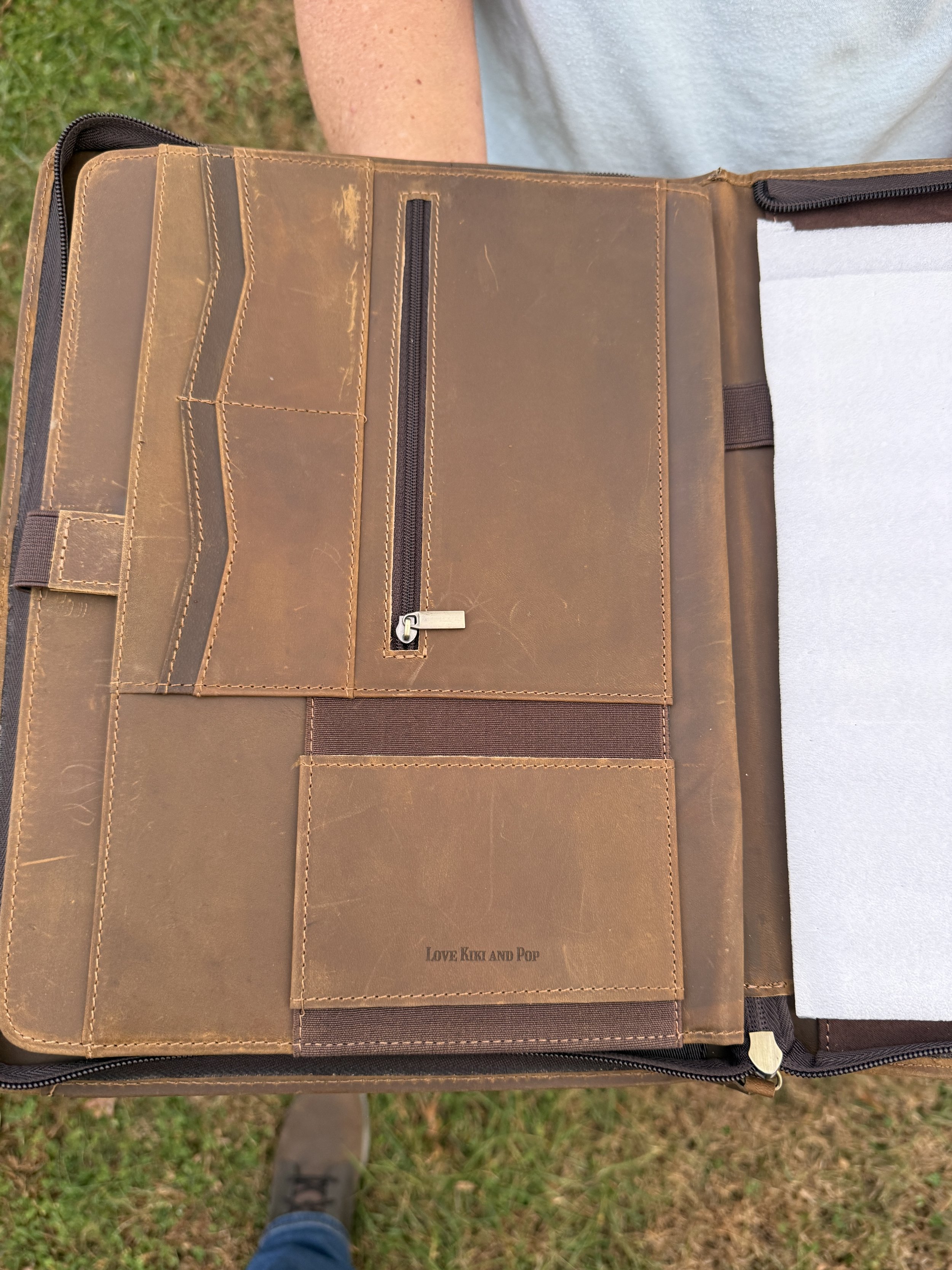 Leather engraved with name.