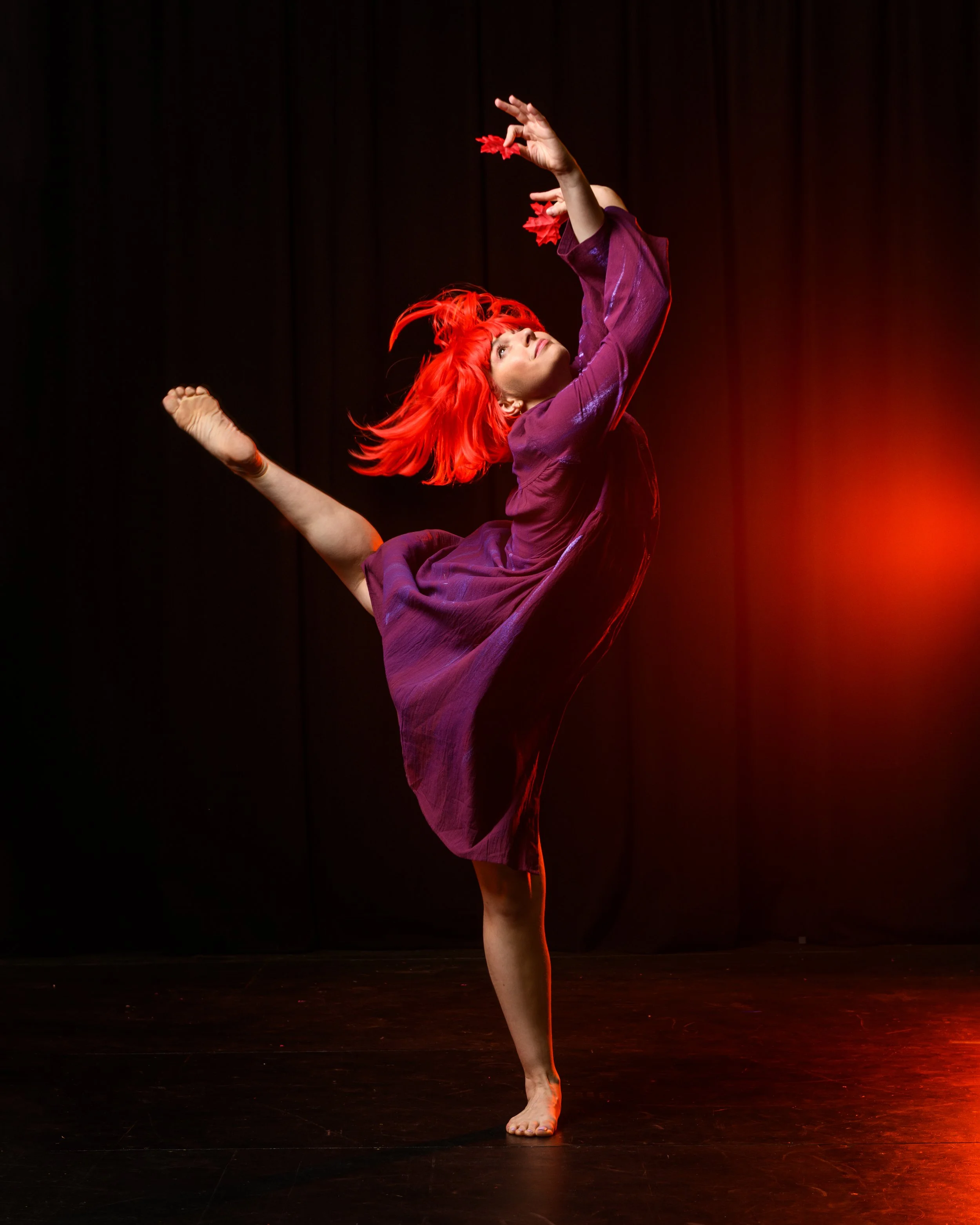Female dancer performs expressive movement in Phluxus2’s touring production of Shaun Tan's The Red Tree.