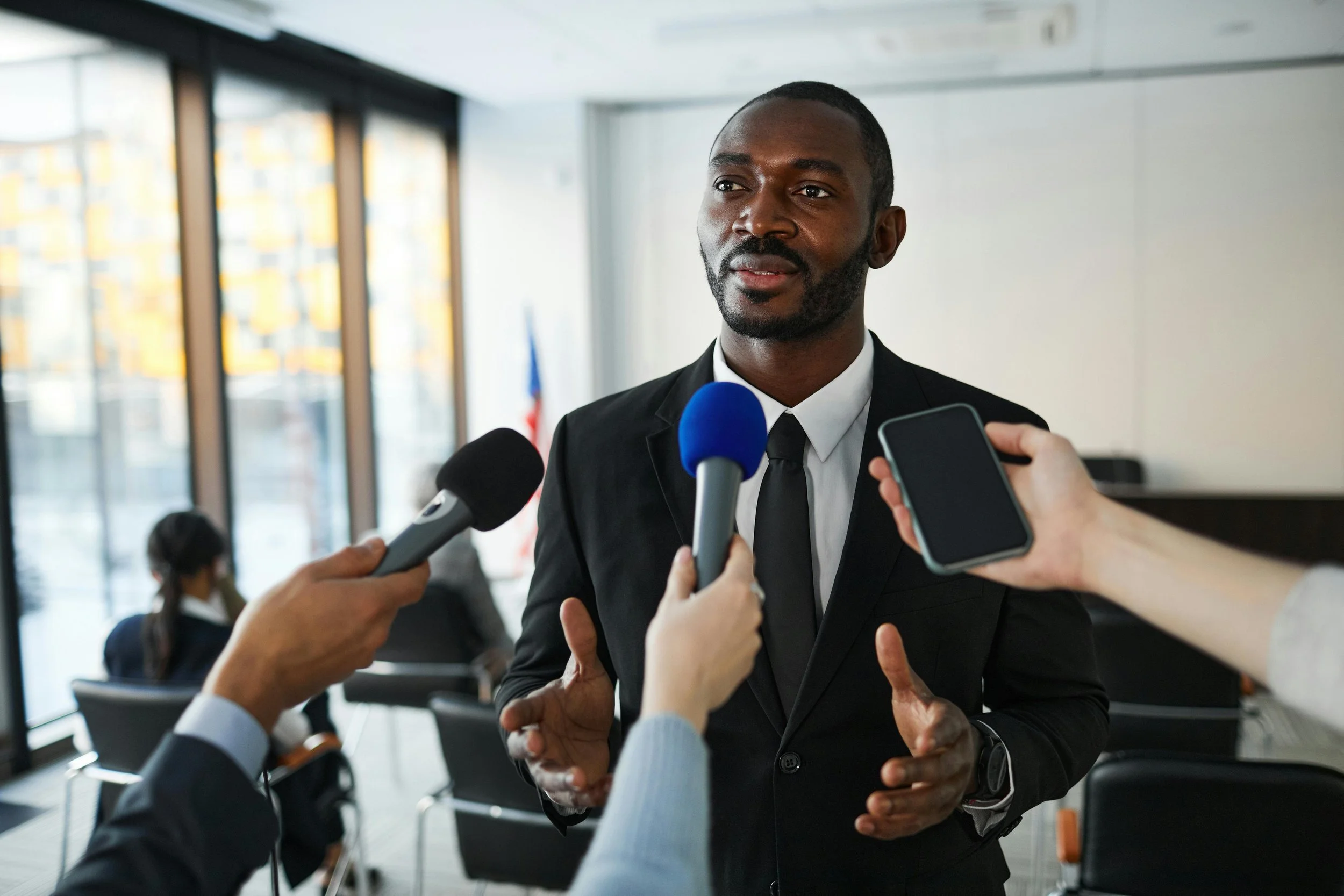 Gentleman being interviewed by news outlets