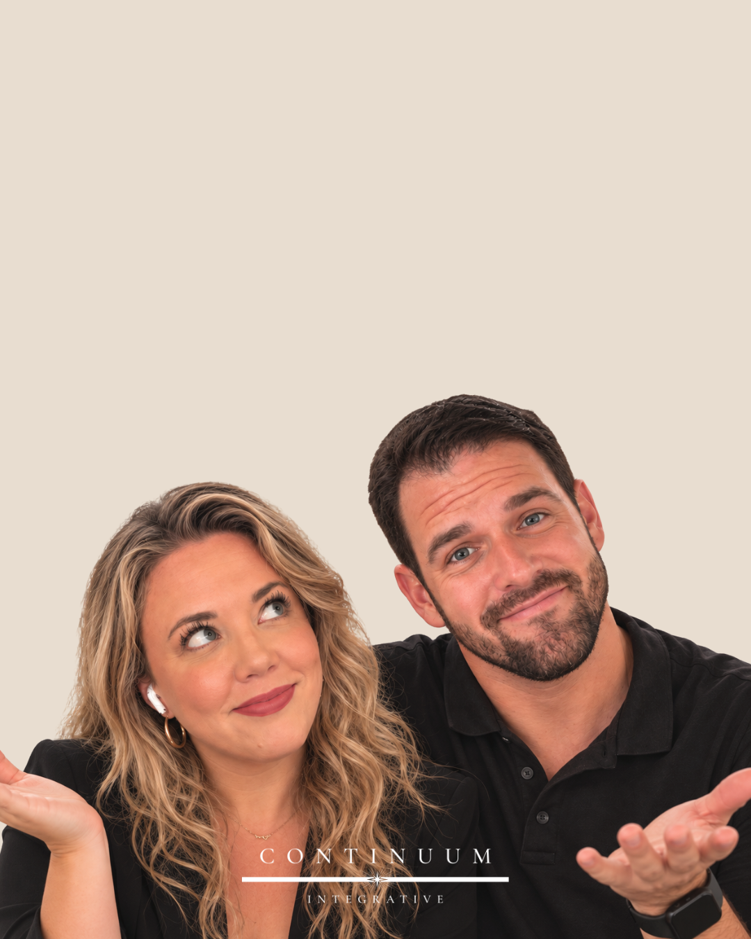A man and woman with light skin and brown hair, both smiling and looking in different directions against a plain background. The woman has blonde, curly hair and is wearing earbuds, while the man has short brown hair and a beard. They are dressed in black, with the woman in a blazer and the man in a polo shirt. The logo 'CONTINUUM INTEGRATIVE' is at the bottom of the image.