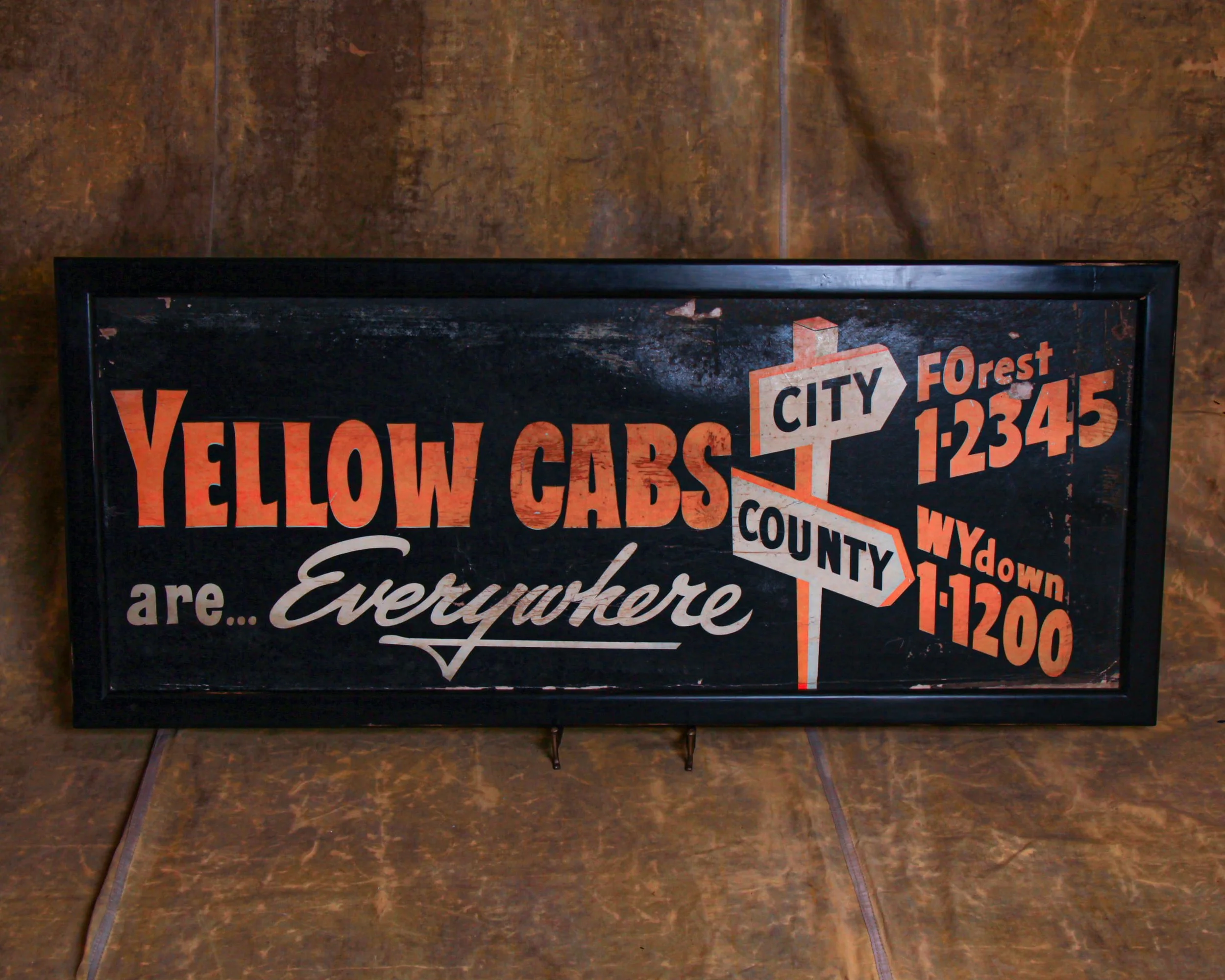 yellow-cab-taxi-sign.jpg