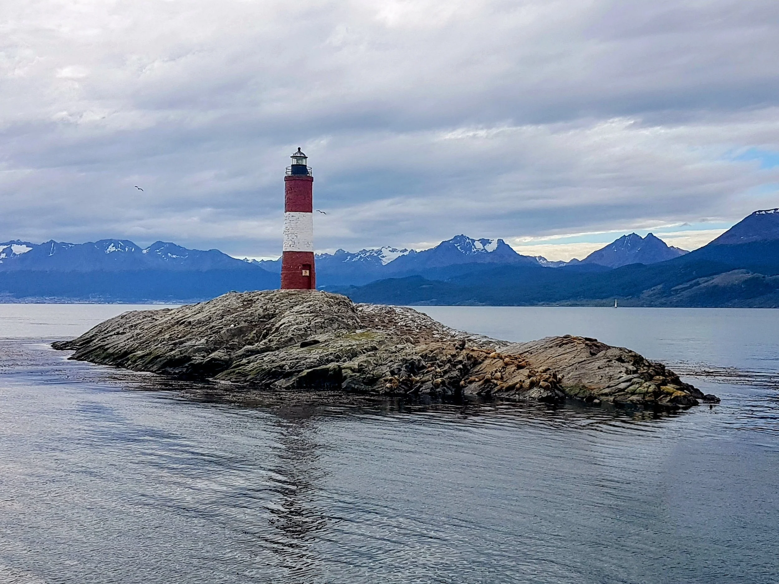 Lighthouse overlooking the ocean, representing strategic guidance and clarity.
