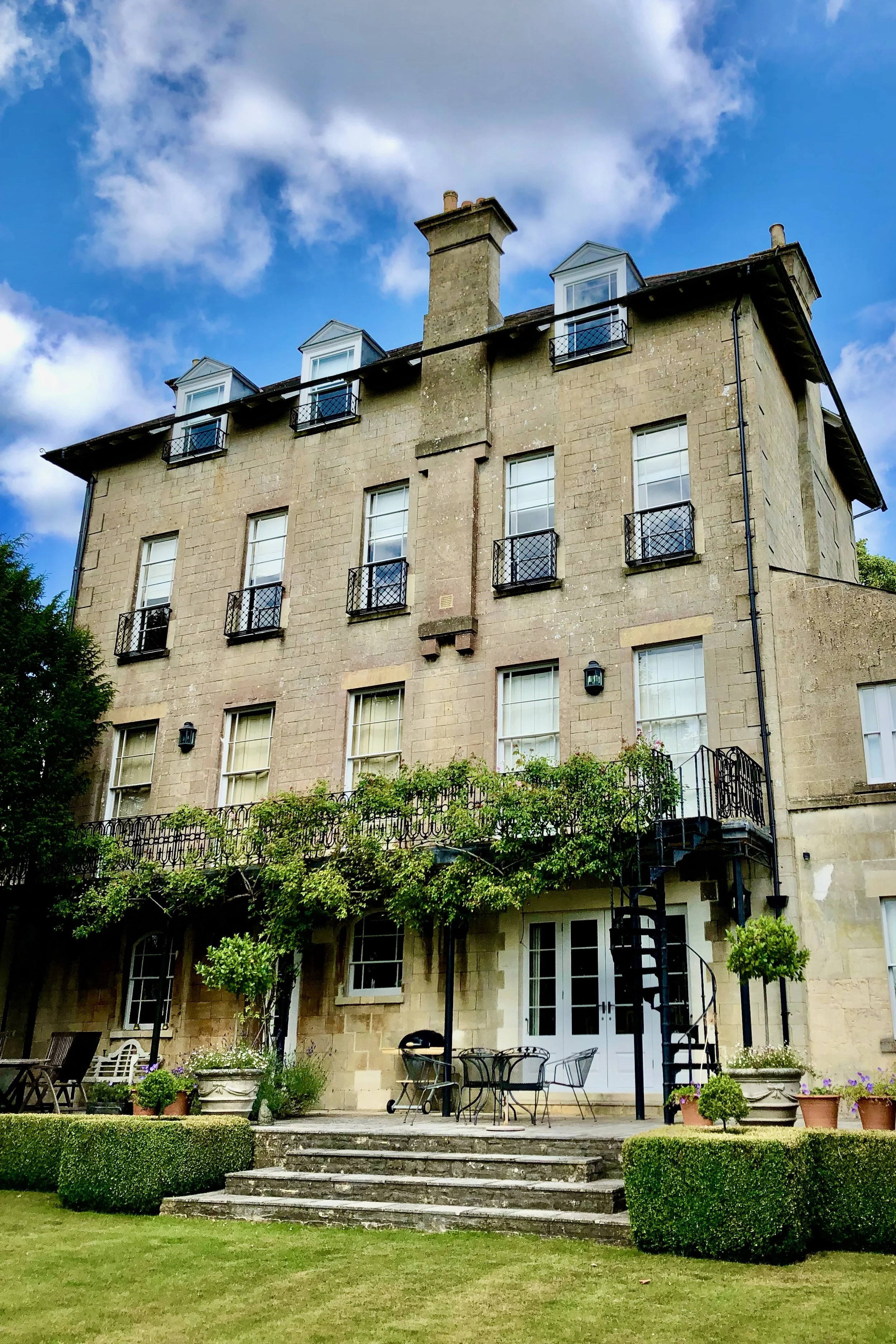Exterior of Bath building and painted windows and railings