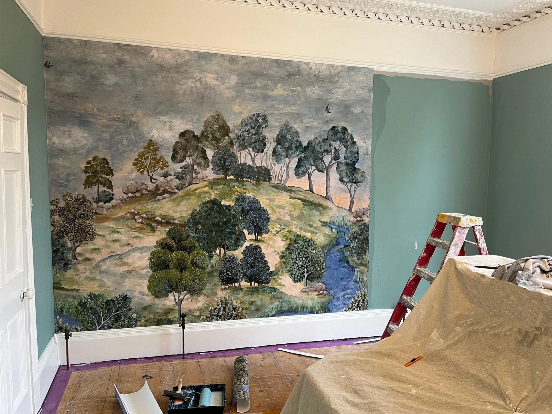 Unique wallpapered wall scene done by Paintworks