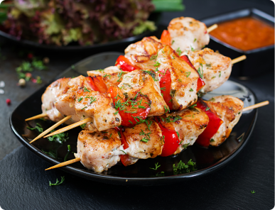Chicken skewers with slices sweet  peppers dill