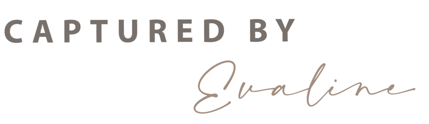 Text saying "Captured by Eveline" in gray and black, with a cursive font for "Eveline".