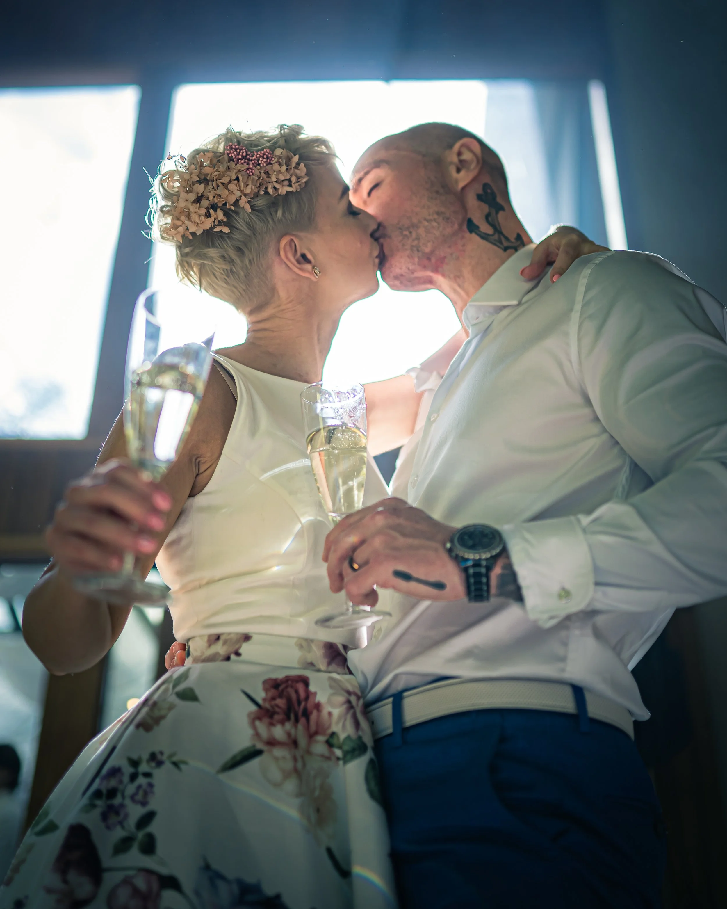between-light-photography-wedding-couple-cheers-champagne.jpeg