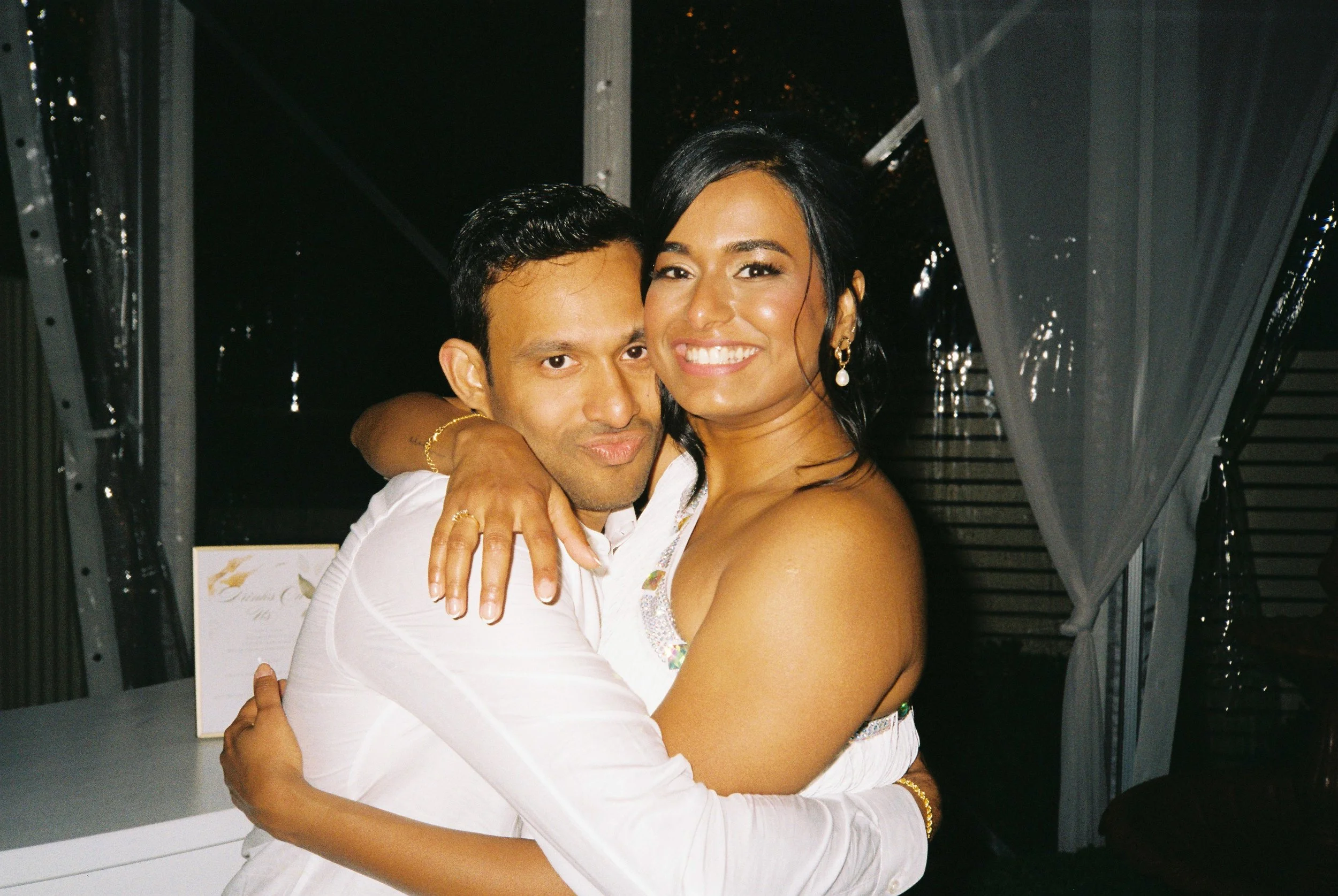 adelaide-wedding-photographer_couple-hug-reception-night.jpg