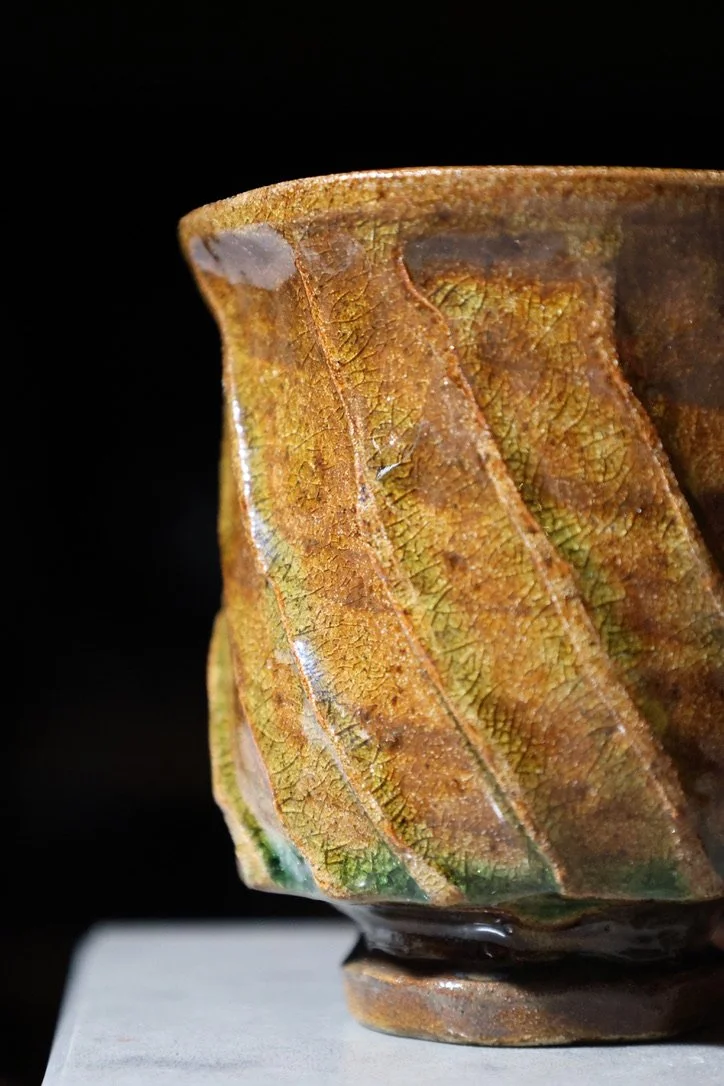 twisted cup with green crackle glaze