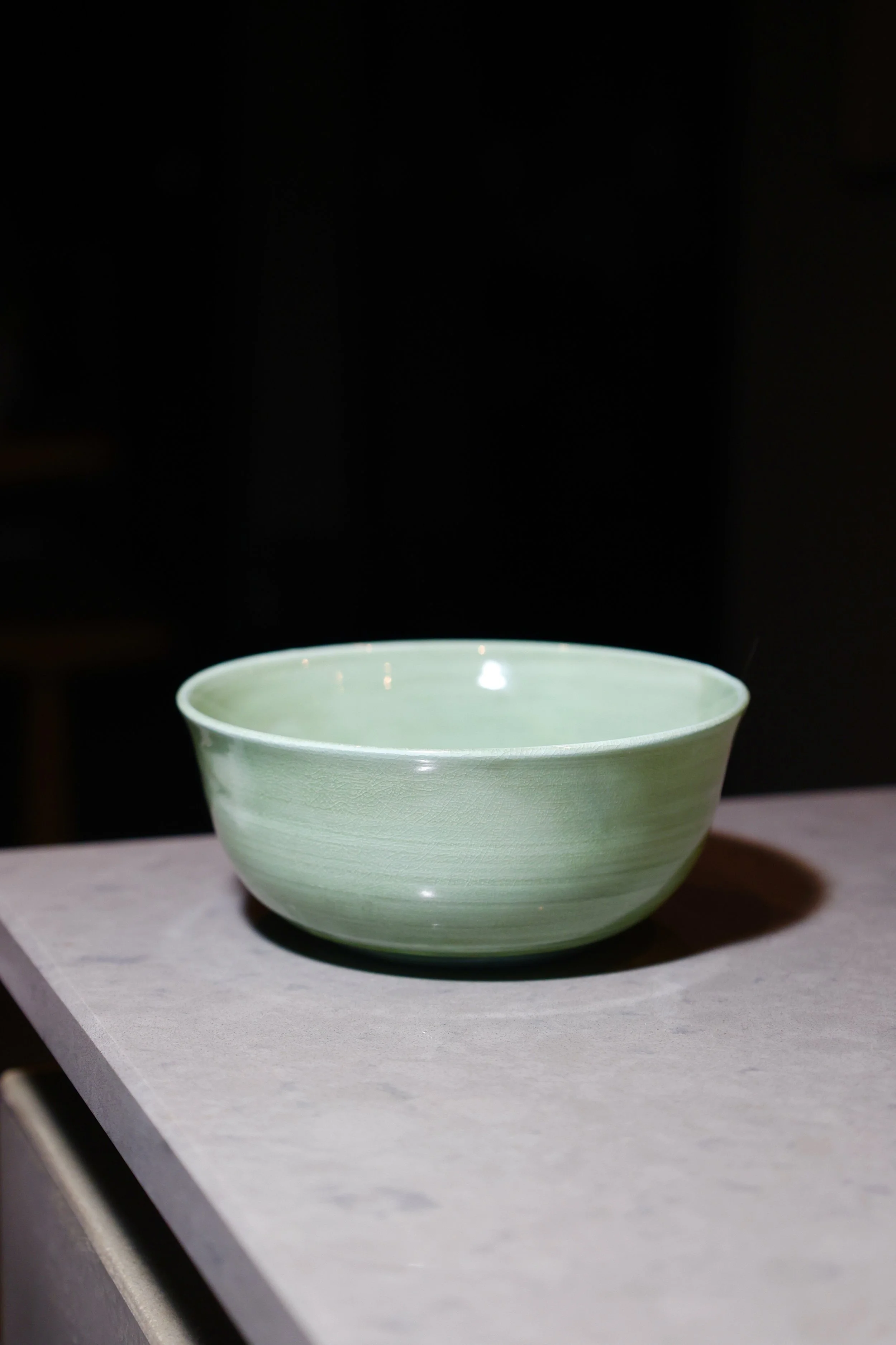 porcelain bowl with green crackle glaze