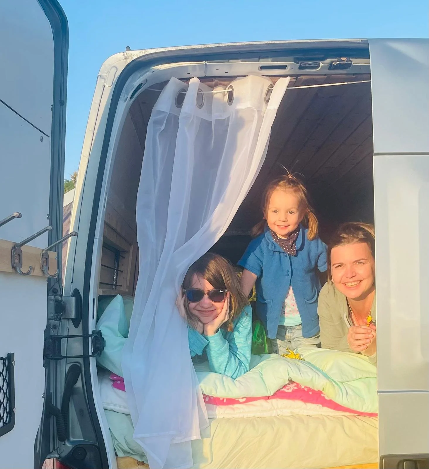 Family pic in older campervan of the Morgan family - TXM Campers Inverness