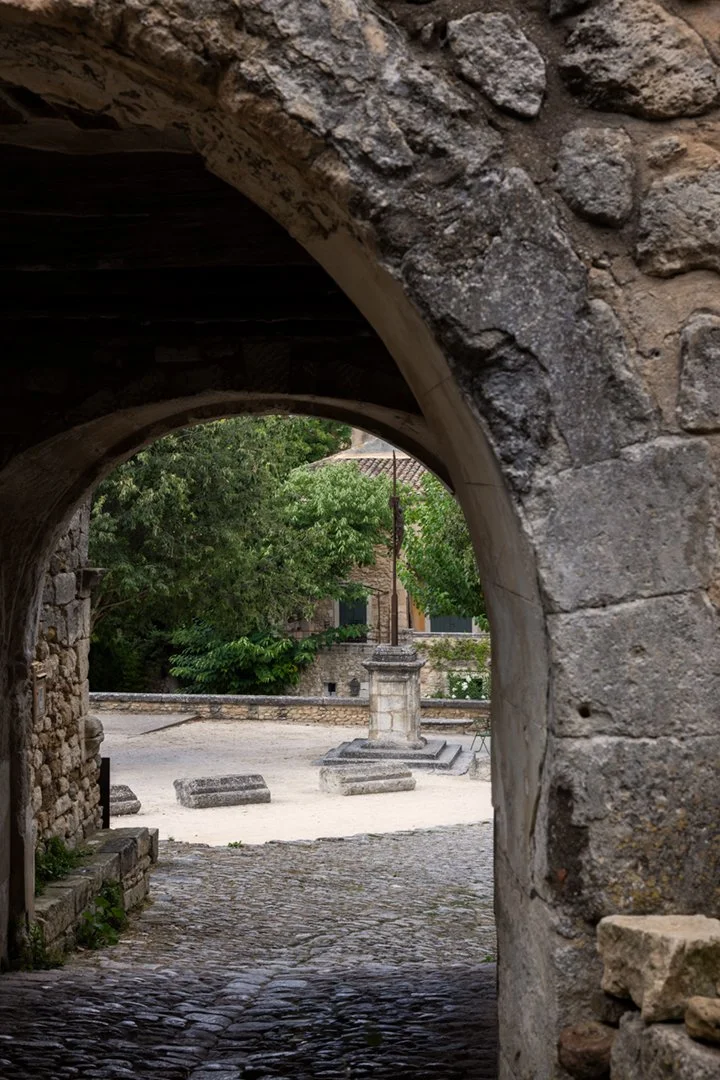 Mission cross in the Place de la Croix in Oppede-le-Vieux France