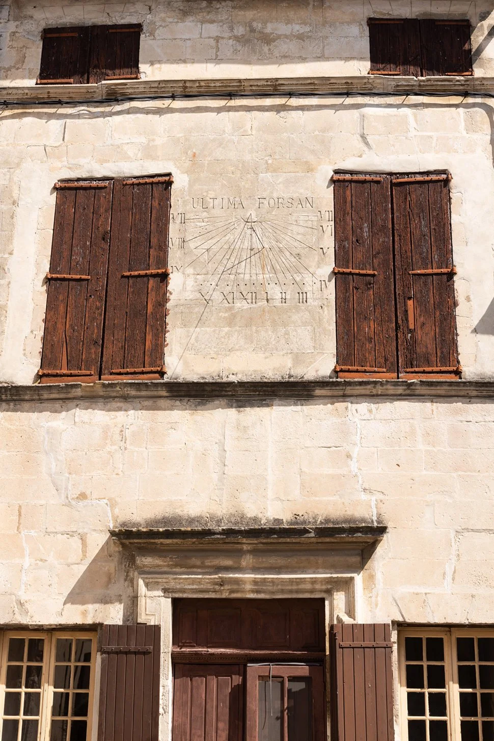 sundial in Place Albert Roure in Menerbes France