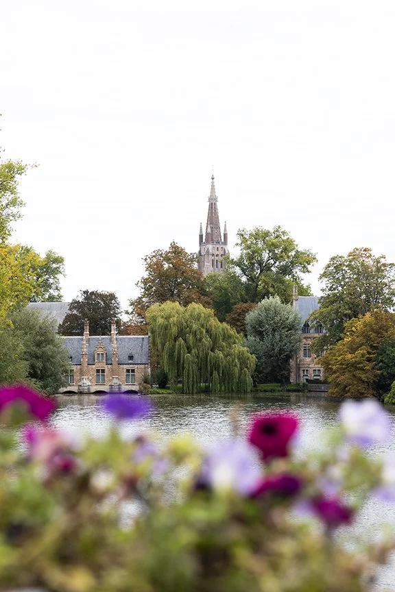 Lock Keepers House and the Church of Our Lady in Bruges Belgium