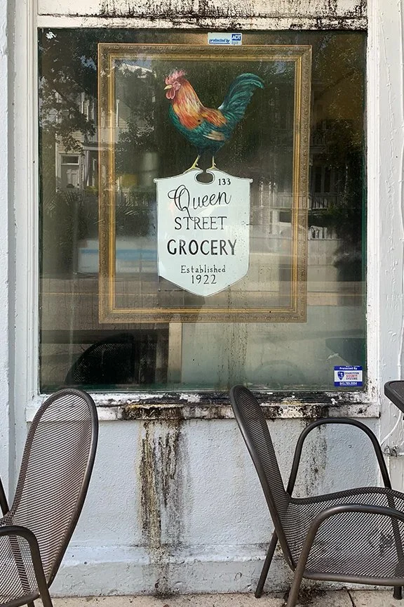 Window signage at Queen Street Grocery, Charleston