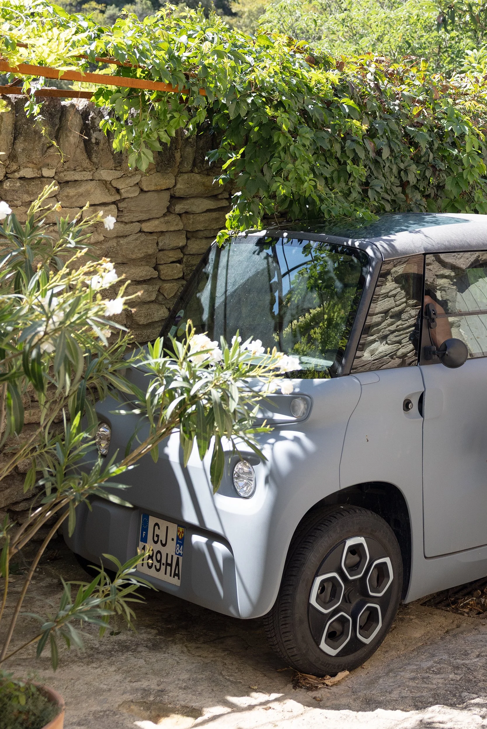 cute car parked on Rue Jean Deyrolle in Gordes, France