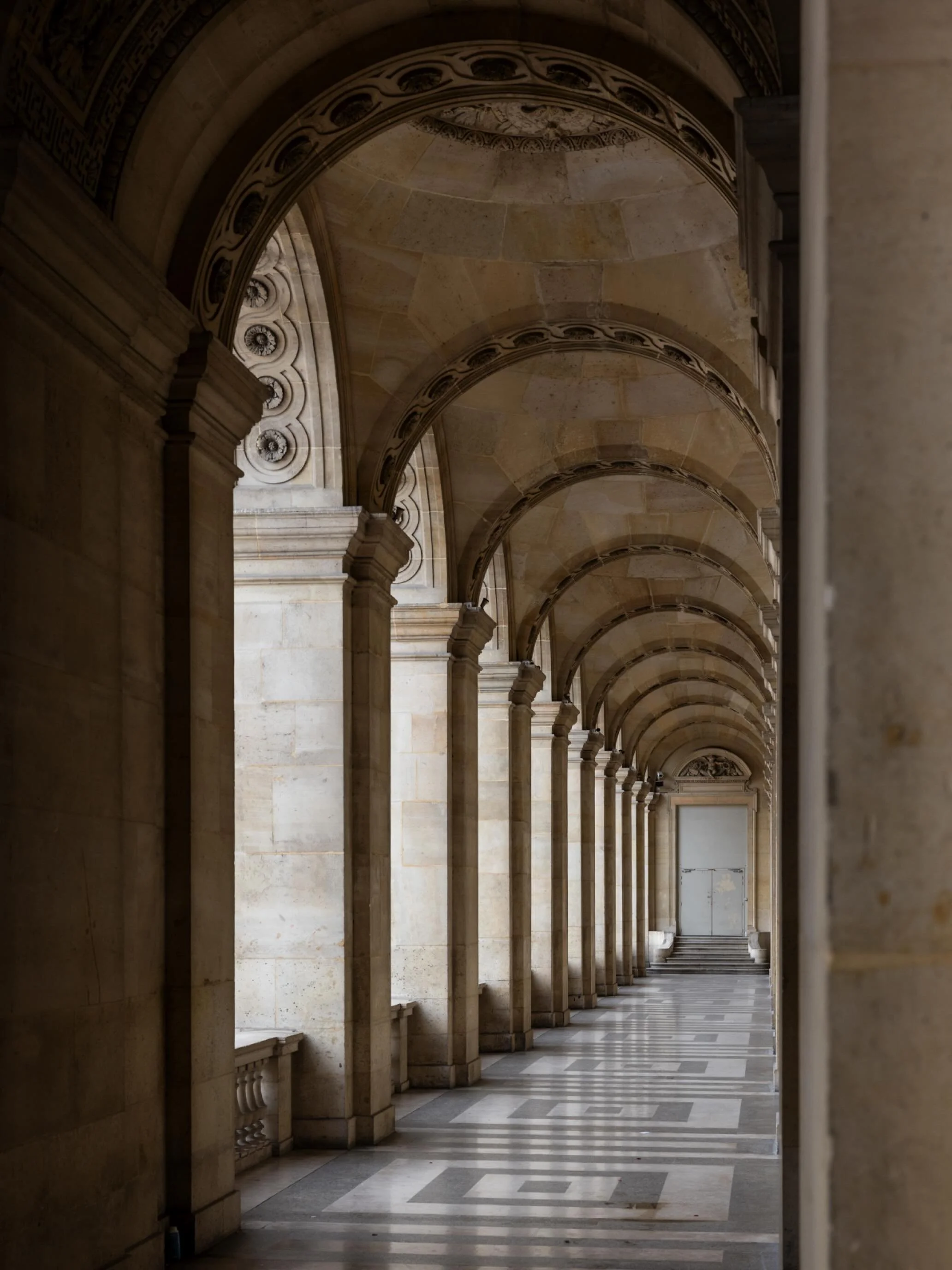 Each archway frames a new perspective of the museum&rsquo;s courtyard, and you can almost hear the whispers of history echoing through these passages.

#Louvre #Paris #LouvreMuseum #ParisArchitecture #TravelParis