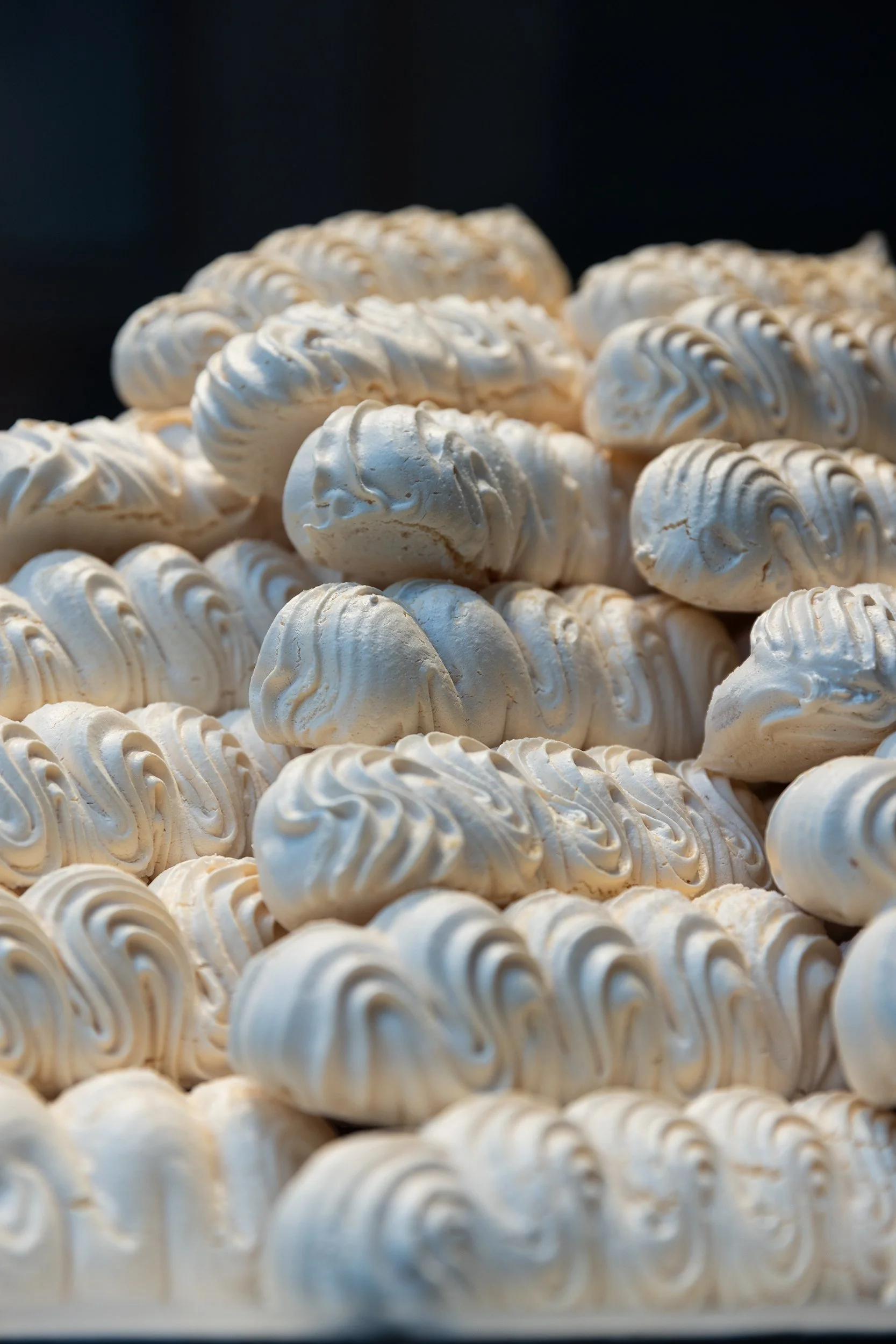 Meringues on display in the window at Aux Merveilleux De Fred, Brussels