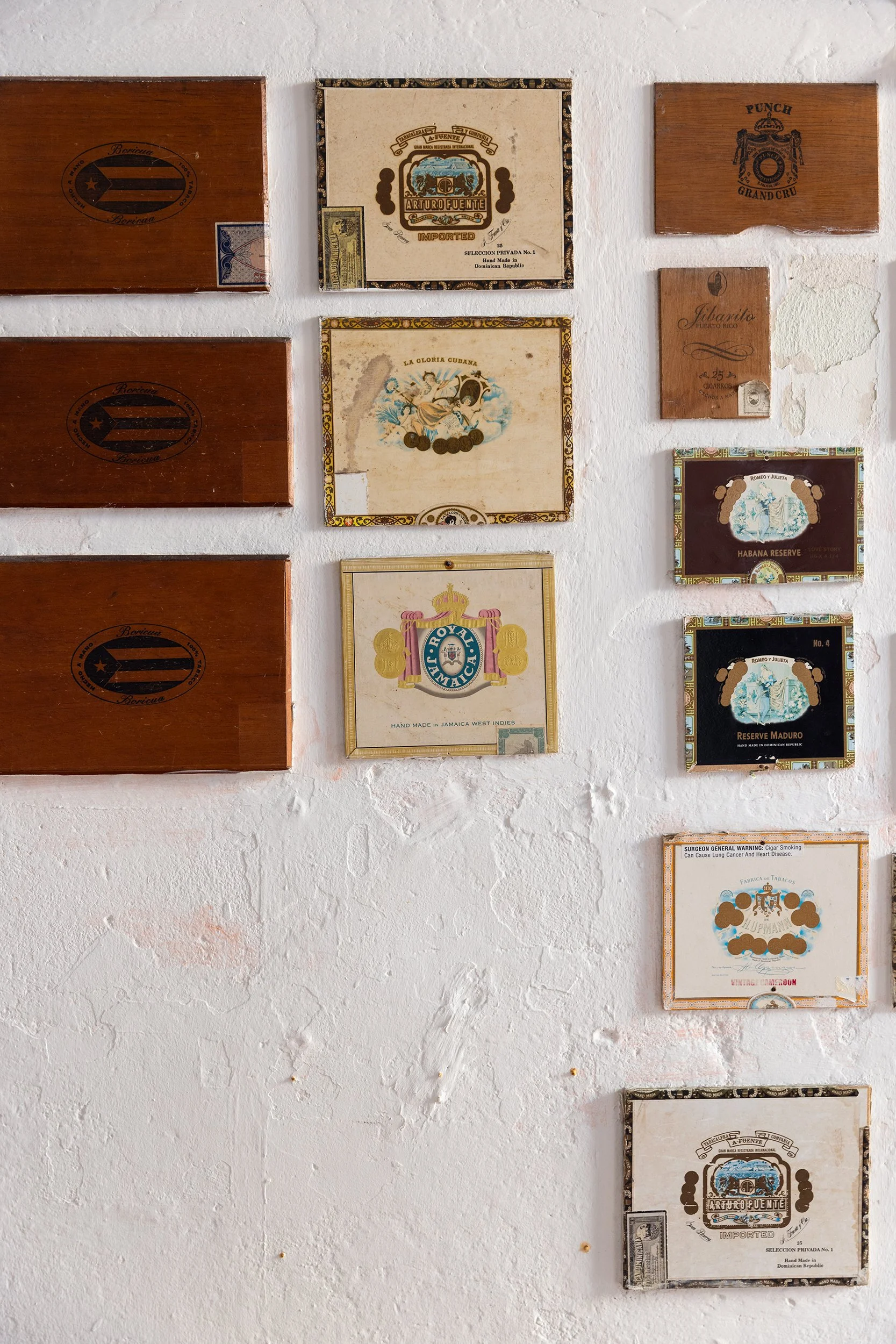 Cigar boxes on display outside the shop El Galpón, San Juan, Puerto Rico