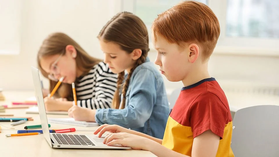 Kids with school laptops