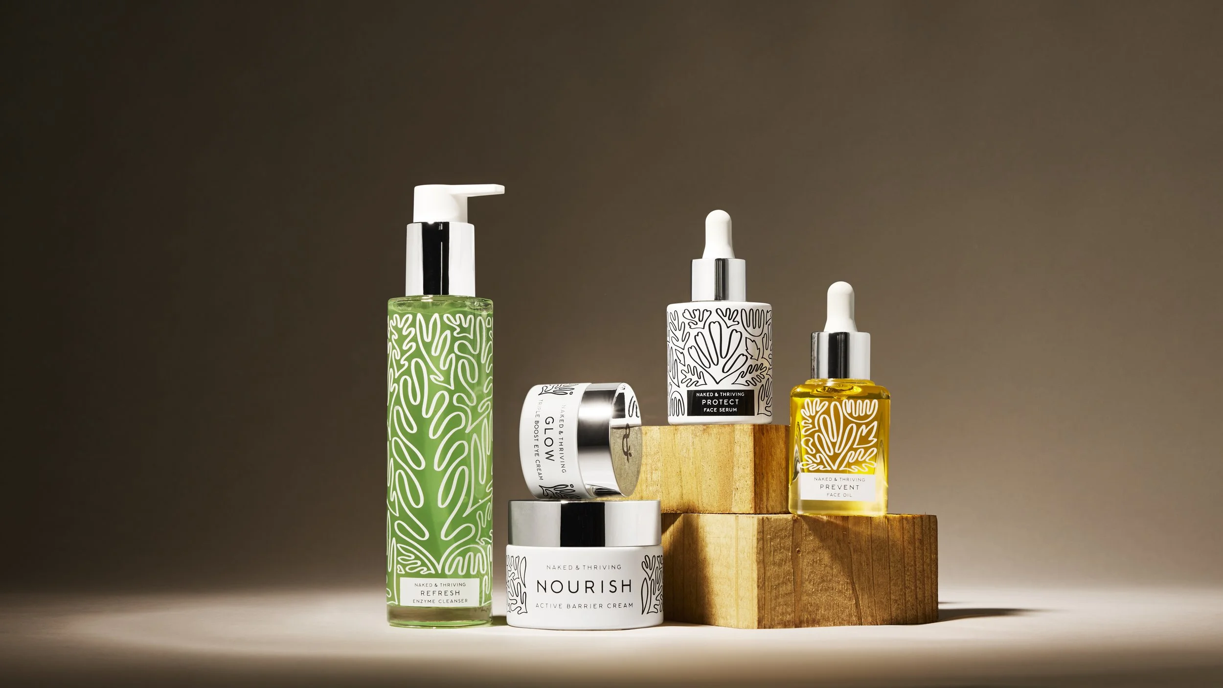 Creative direction by Margaret Kimball for Naked & Thriving’s Fall 2025 Fall Into Radiance campaign, featuring nature-inspired imagery and modern skincare design.