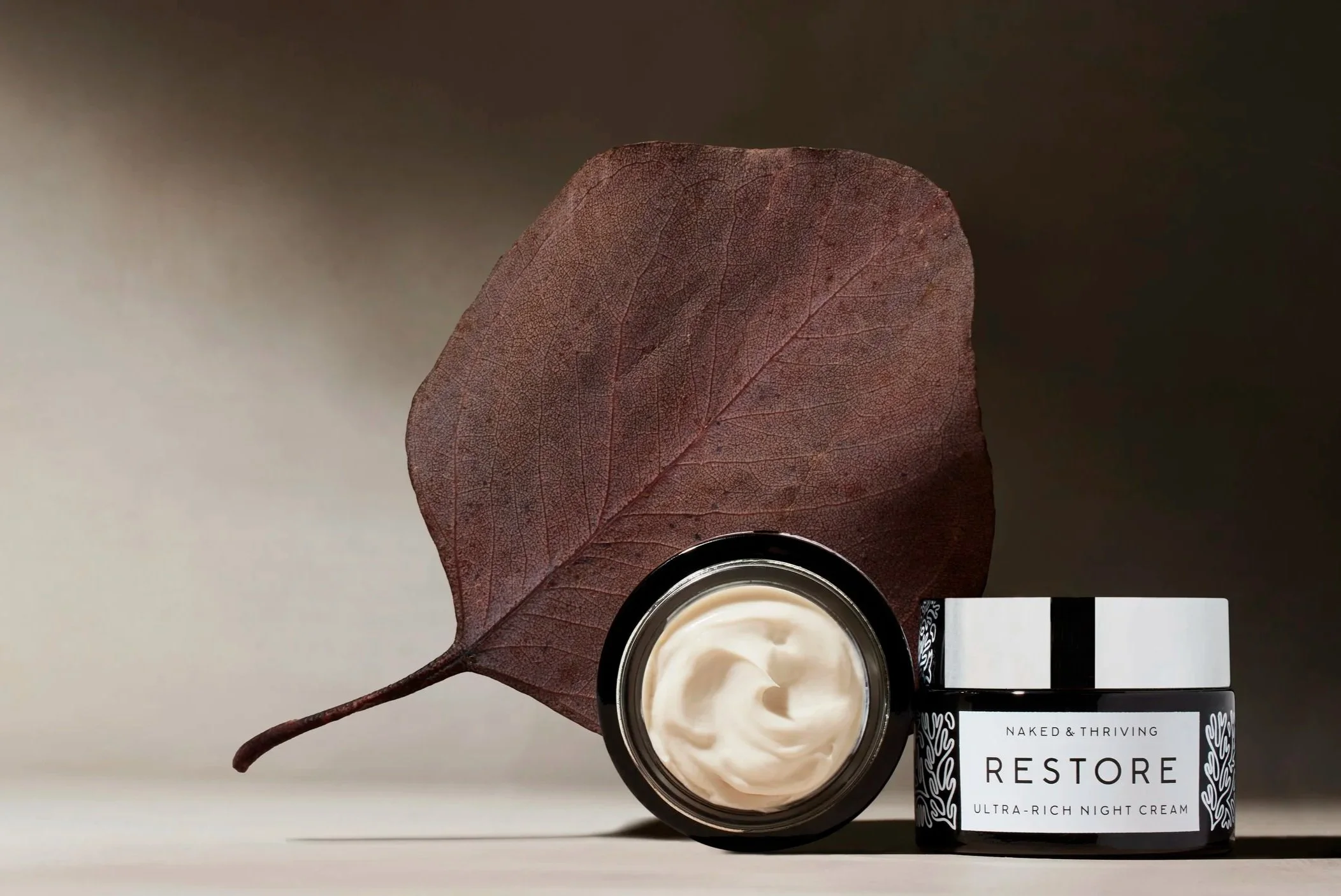 Creative direction by Margaret Kimball for Naked & Thriving’s Fall 2025 Fall Into Radiance campaign, featuring nature-inspired imagery and modern skincare design.