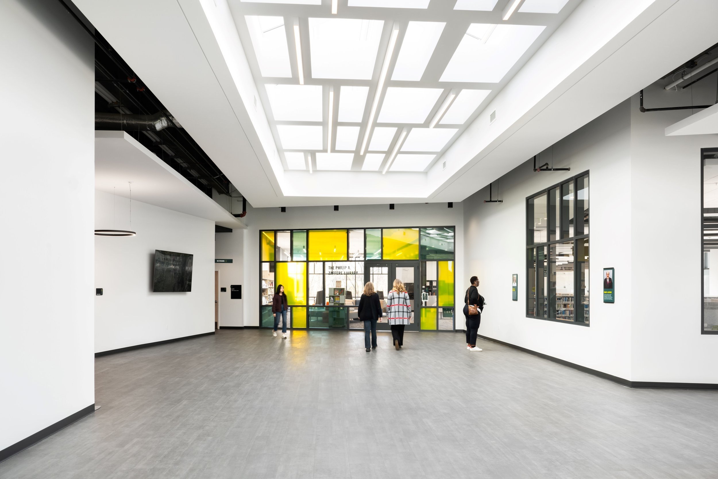11-zaffere-library-the-double-height-lobby-under-a-skylight-looking.jpg