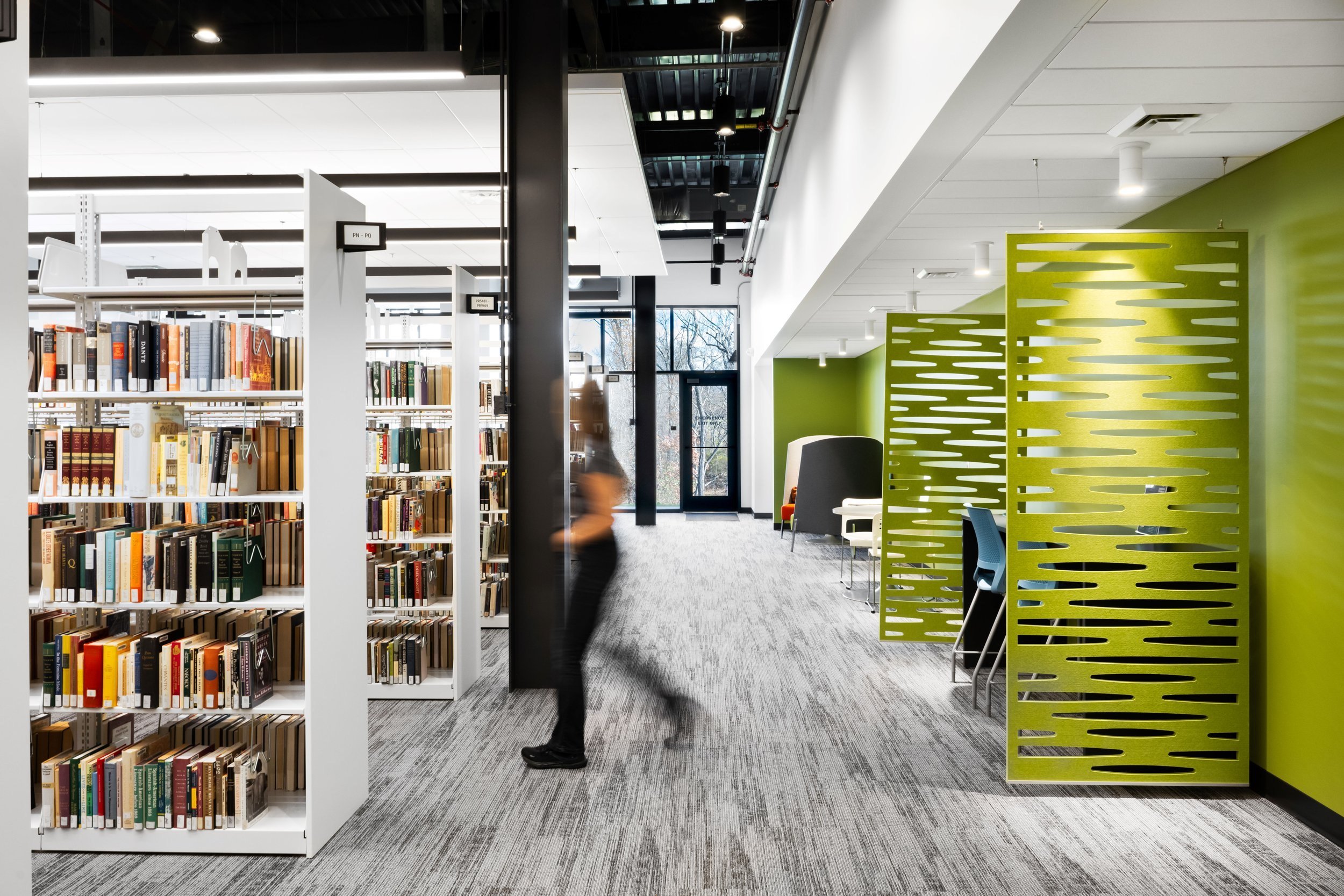 22-zaffere-library-shelving-beside-a-perforated-green-screen.jpg