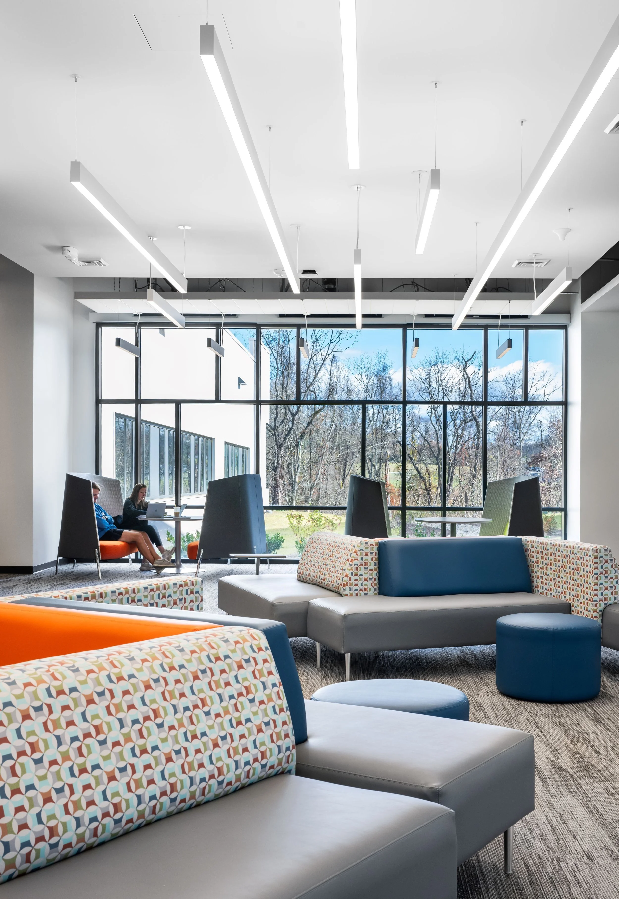 14-zaffere-library-a-lounge-with-upholstered-seating-by-the-windows.jpg