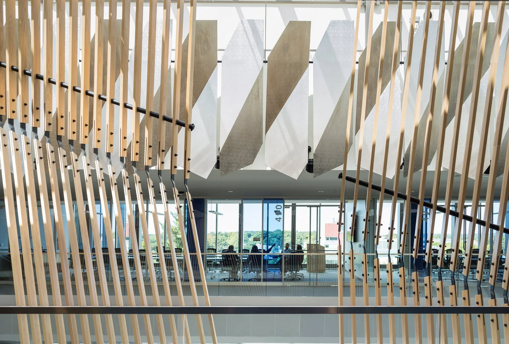 03-university-crossing-vertical-fins-along-a-glazed-lounge.jpg