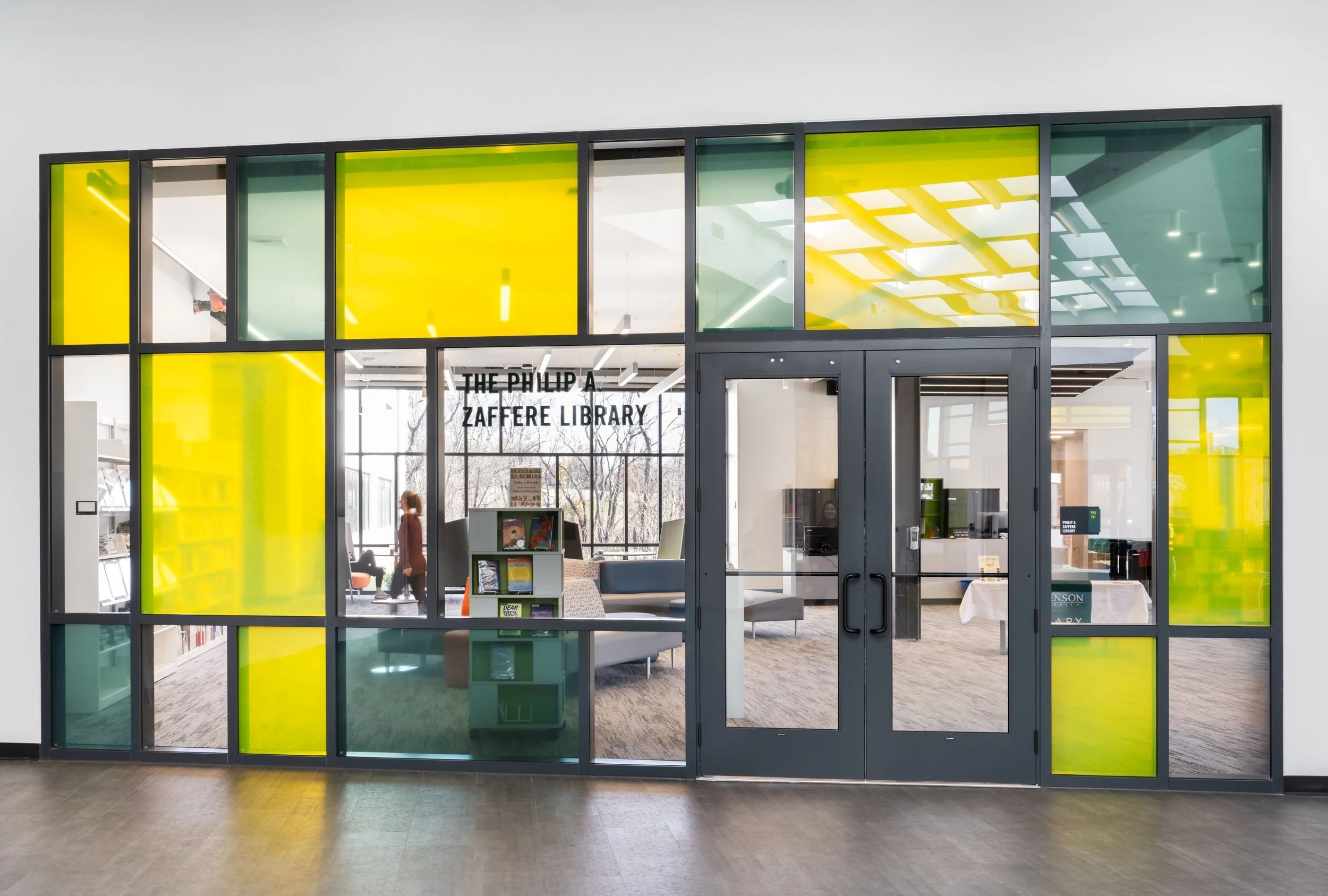 13-zaffere-library-yellow-and-green-glass-around-the-library-s-entr.jpg