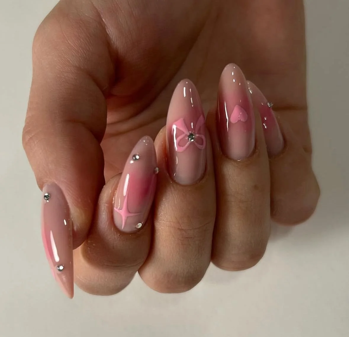 Custom nail art design with detailed accent work applied to selected nails for a balanced, refined look.