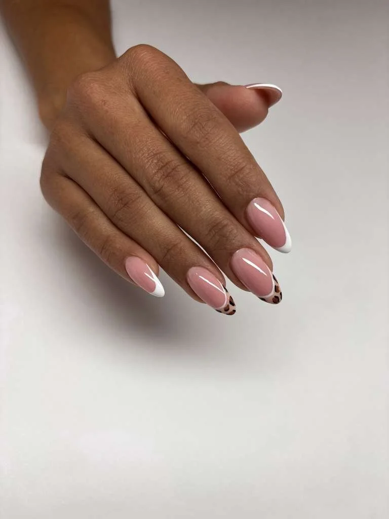 Russian manicure with medium extensions focused on structure, balance, and precise cuticle care using advanced e-file technique.