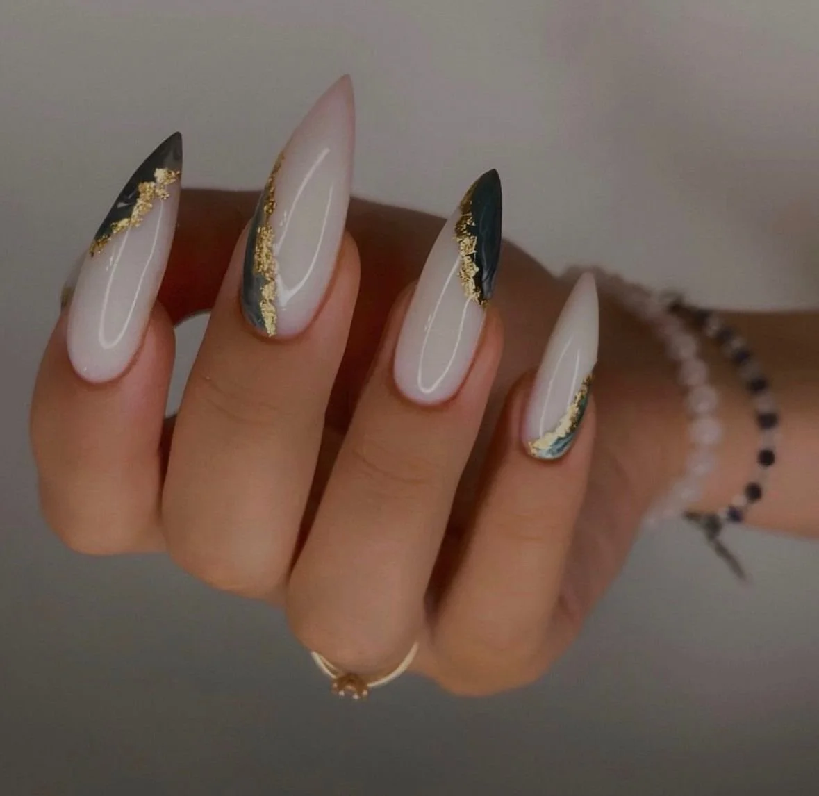 Russian manicure with long hard gel extensions, precision e-file cuticle work, structured nail architecture, and long-lasting results.