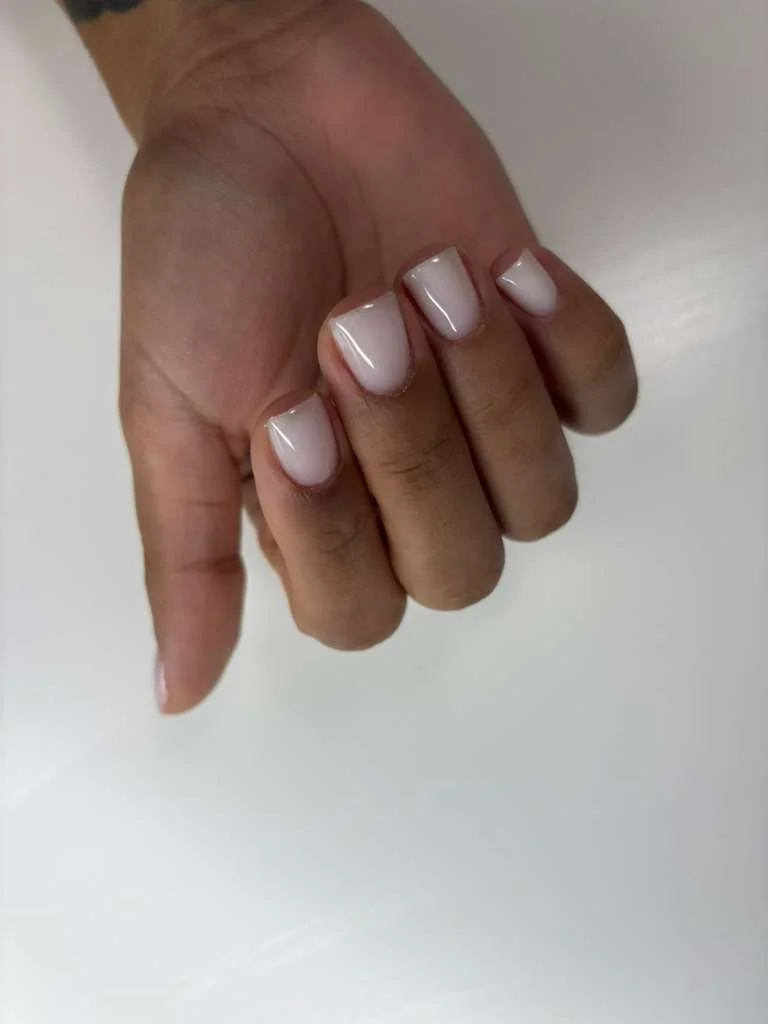 Russian hard gel manicure with structured overlay reinforcing natural nails and supporting long-term durability