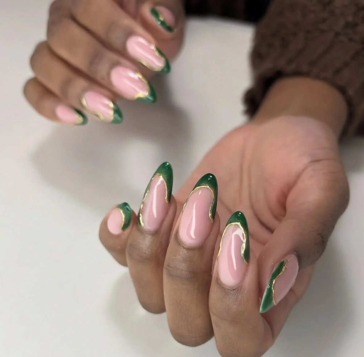 Advanced French tip manicure with high-precision line work and detailed accent design.