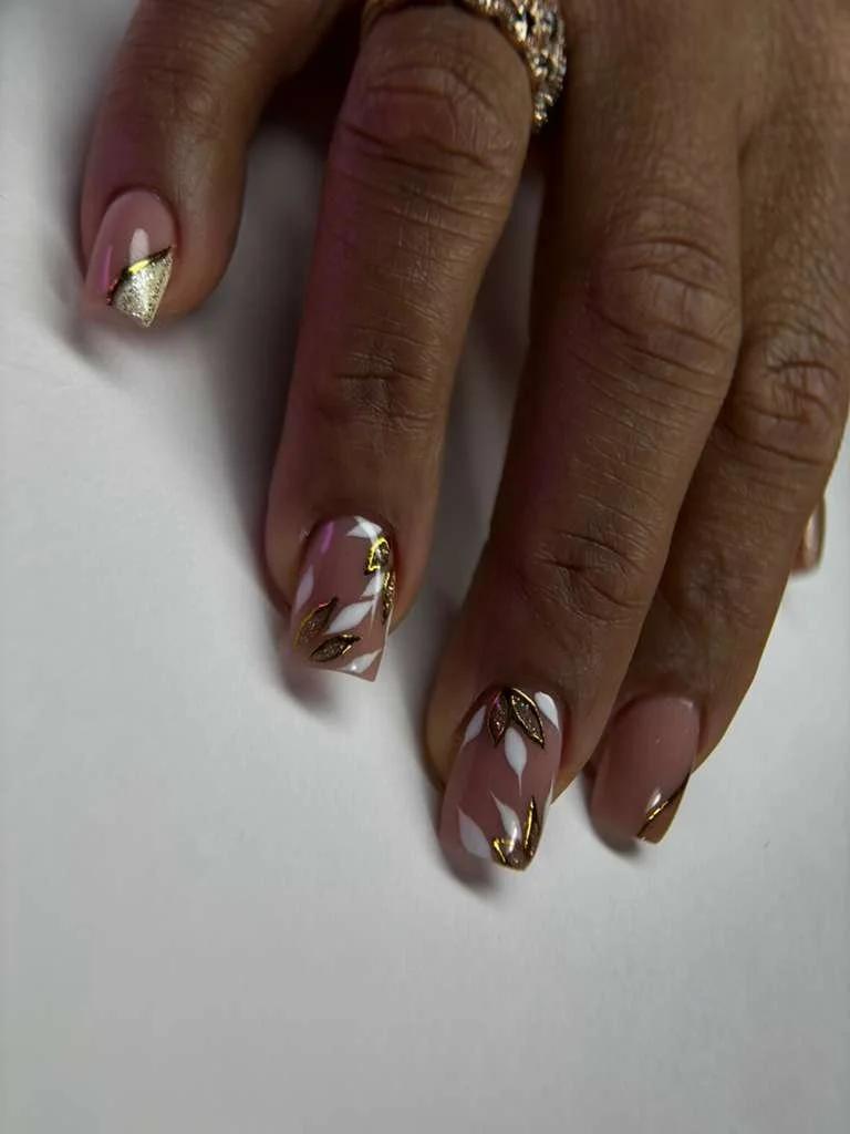 Overview of structured nail extensions after recovery from burned and over-filed nails using a health-first Russian manicure approach.