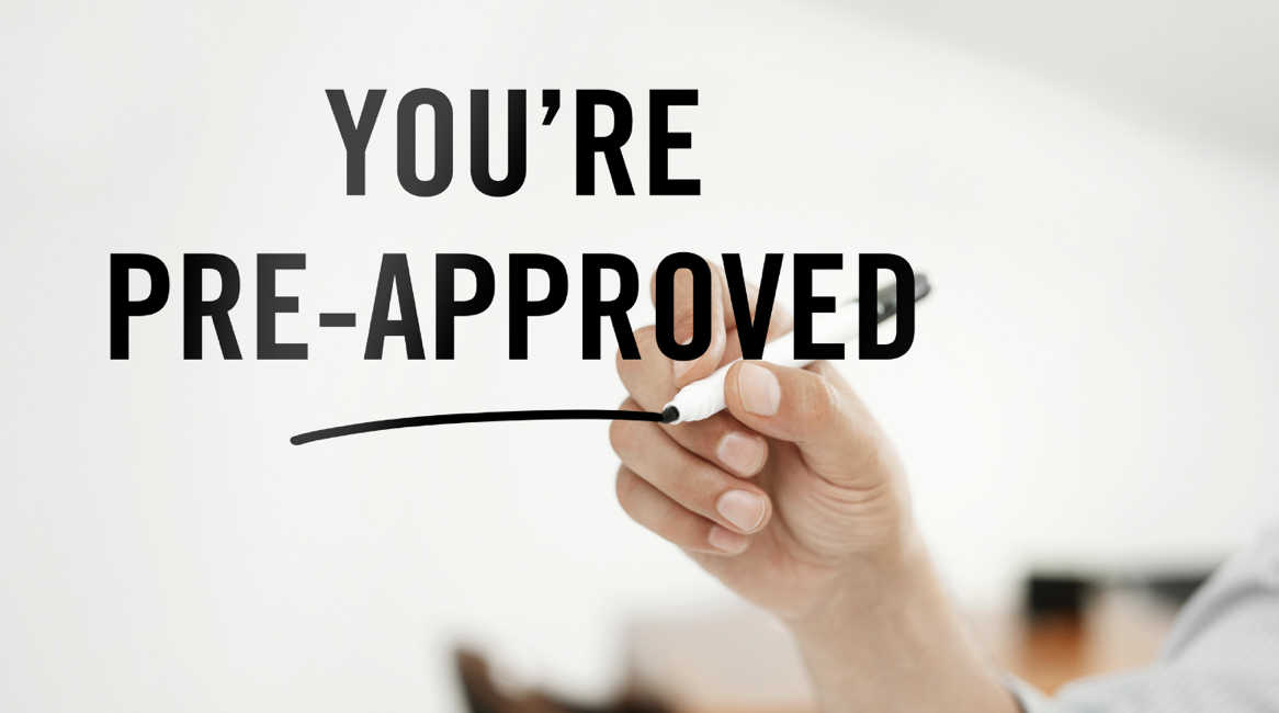 Hand writing on a transparent board with the words "YOU'RE PRE-APPROVED" in bold black text.