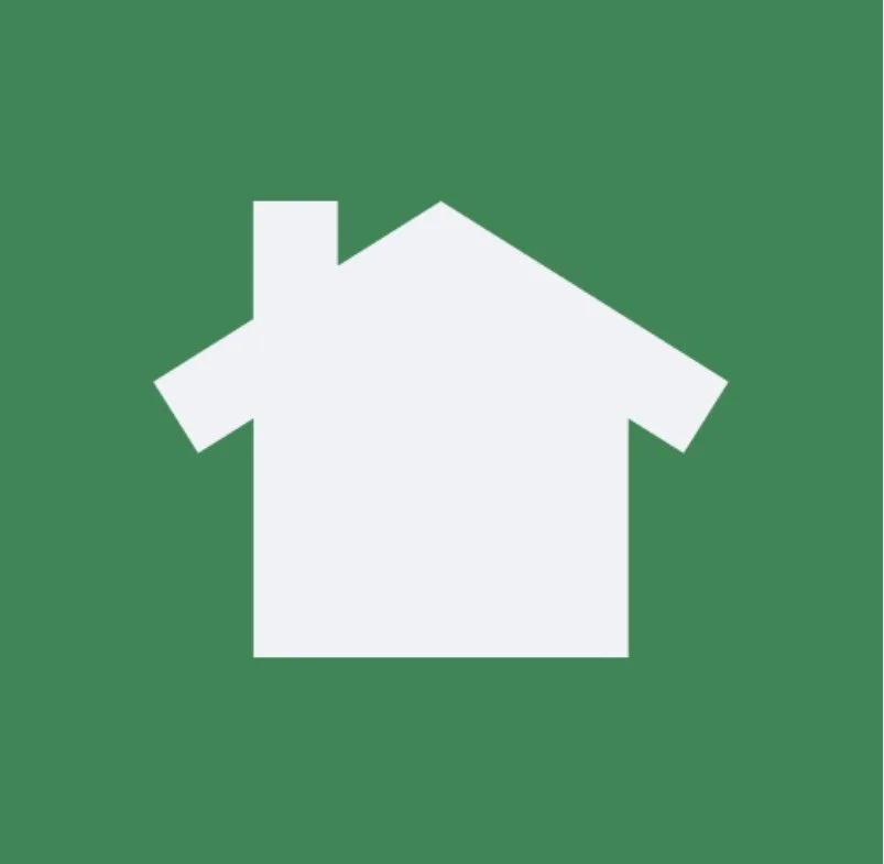 Icon of a white house on a green background.