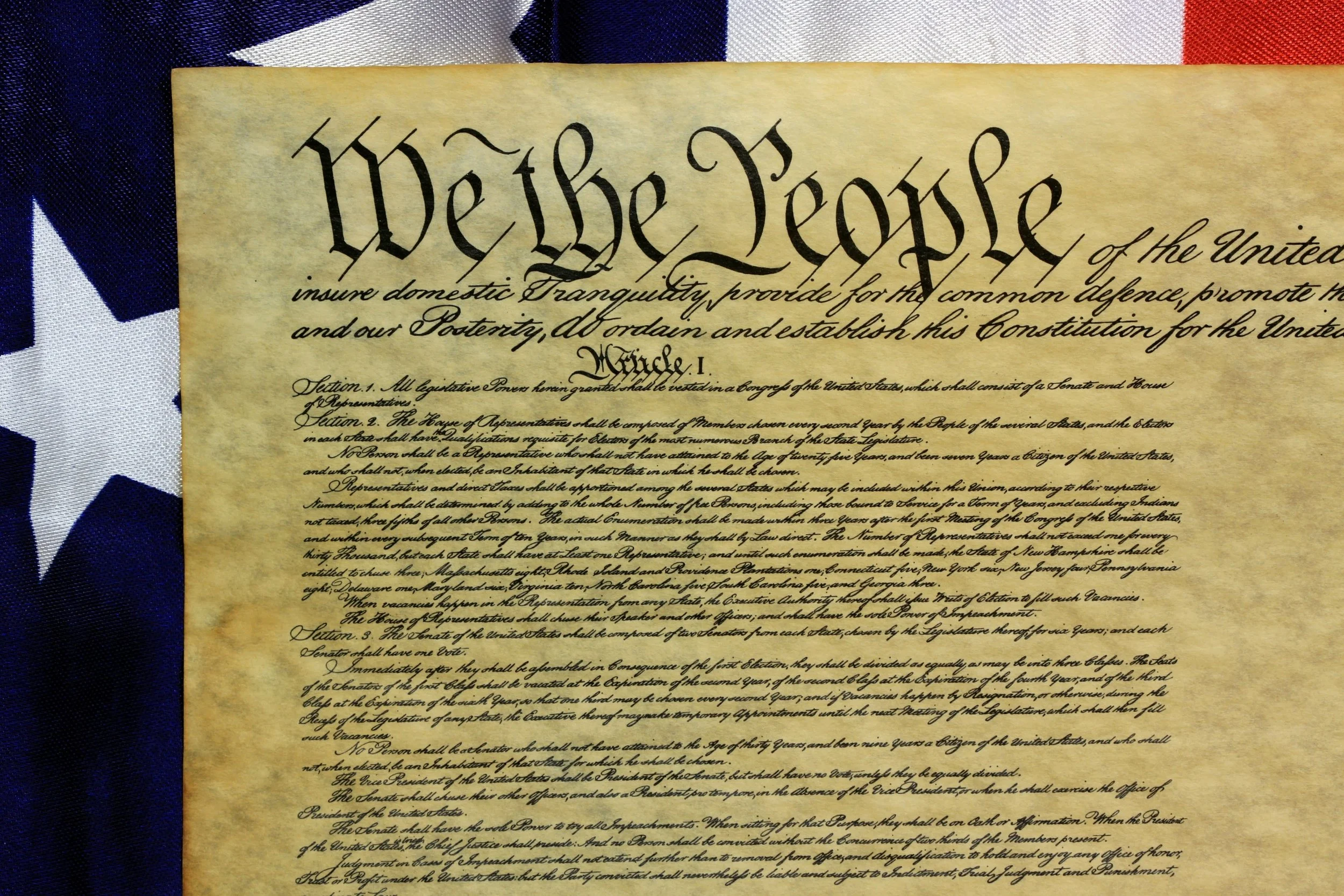 Constitution Document over flag