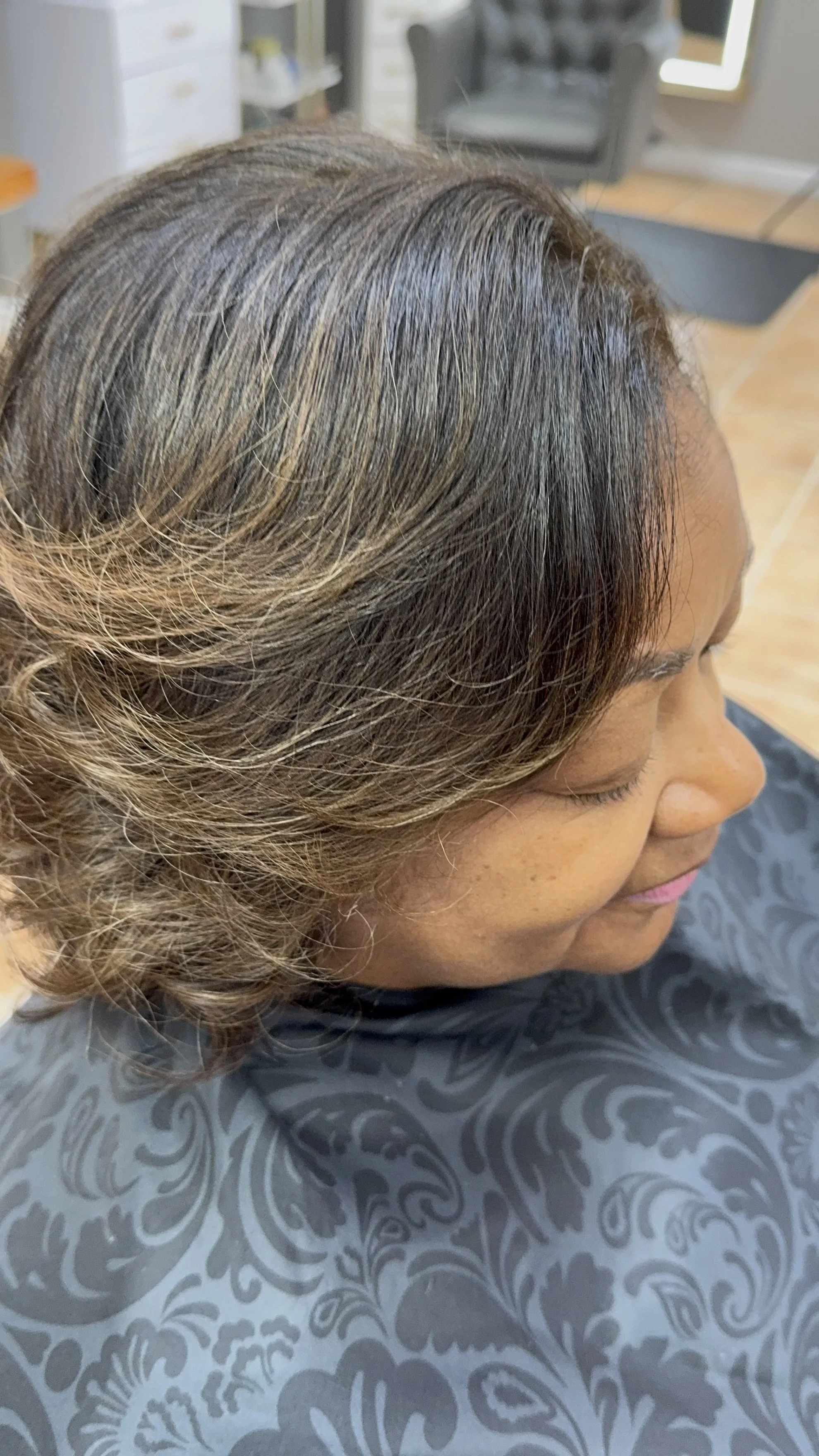 Deluxe Demi Color Refresh and Signature Finish 

Designed for natural clients seeking soft gray coverage and refreshed tone between full color services. This Deluxe experience includes a demi-permanent color application from root to mid-shaft, hydrat