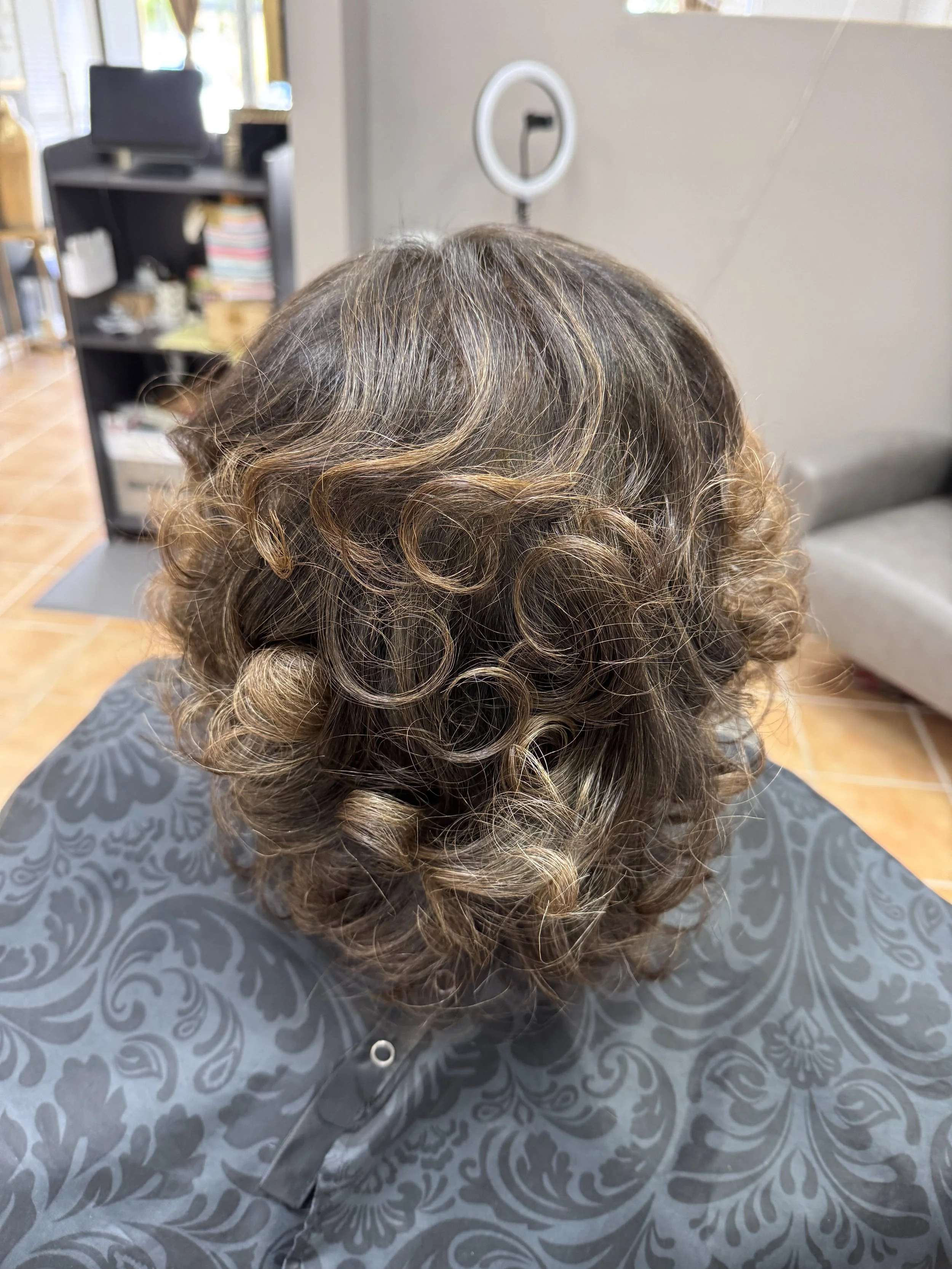 Deluxe Demi Color Refresh and Signature Finish 

Designed for natural clients seeking soft gray coverage and refreshed tone between full color services. This Deluxe experience includes a demi-permanent color application from root to mid-shaft, hydrat