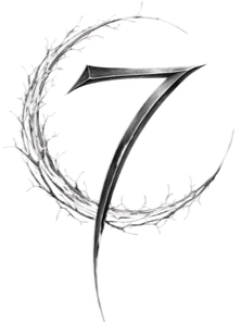 A metallic number seven with a circular, spiked design around it.