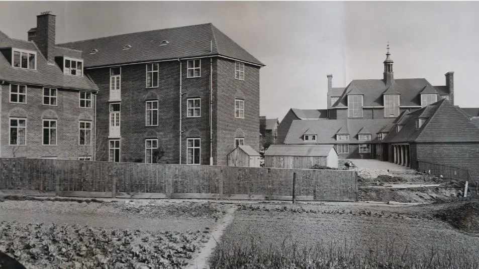 Before and after! These views from 1913 and 2026 show how the college has grown and changed over the decades, while College House and the Main Building remain largely unchanged. 
Discover this display and more, including our Alumni and War display, a