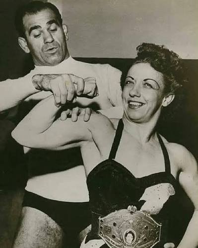 mildred burke and billy wolfe.jpeg