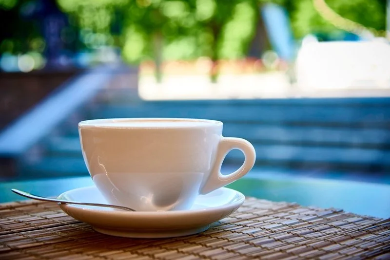 White_Mug_Of_Coffee out doors